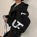 Women’s zip-up printed sweatshirt hoodie by FitiqueFit, long sleeve casual jacket with colorful pattern and front zipper.