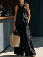 Plus size ruffled halter neck top and wide-leg pants set by Shopimist, stylish two-piece outfit with vibrant design and comfortable fit.