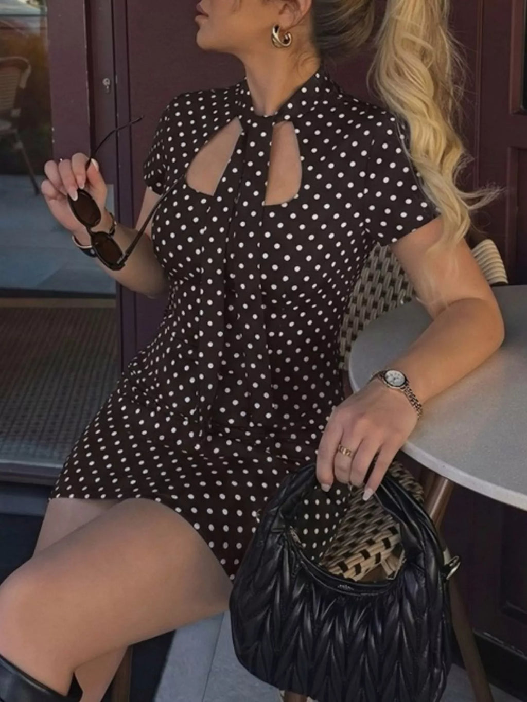 Polka dot cut-out front mini dress by Shopimist featuring a stylish design and playful pattern, perfect for casual or party wear.