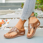 Women's stylish faux leather toe post wedge sandals with mid-heel, featuring comfortable design and trendy fashion from Trendsi.