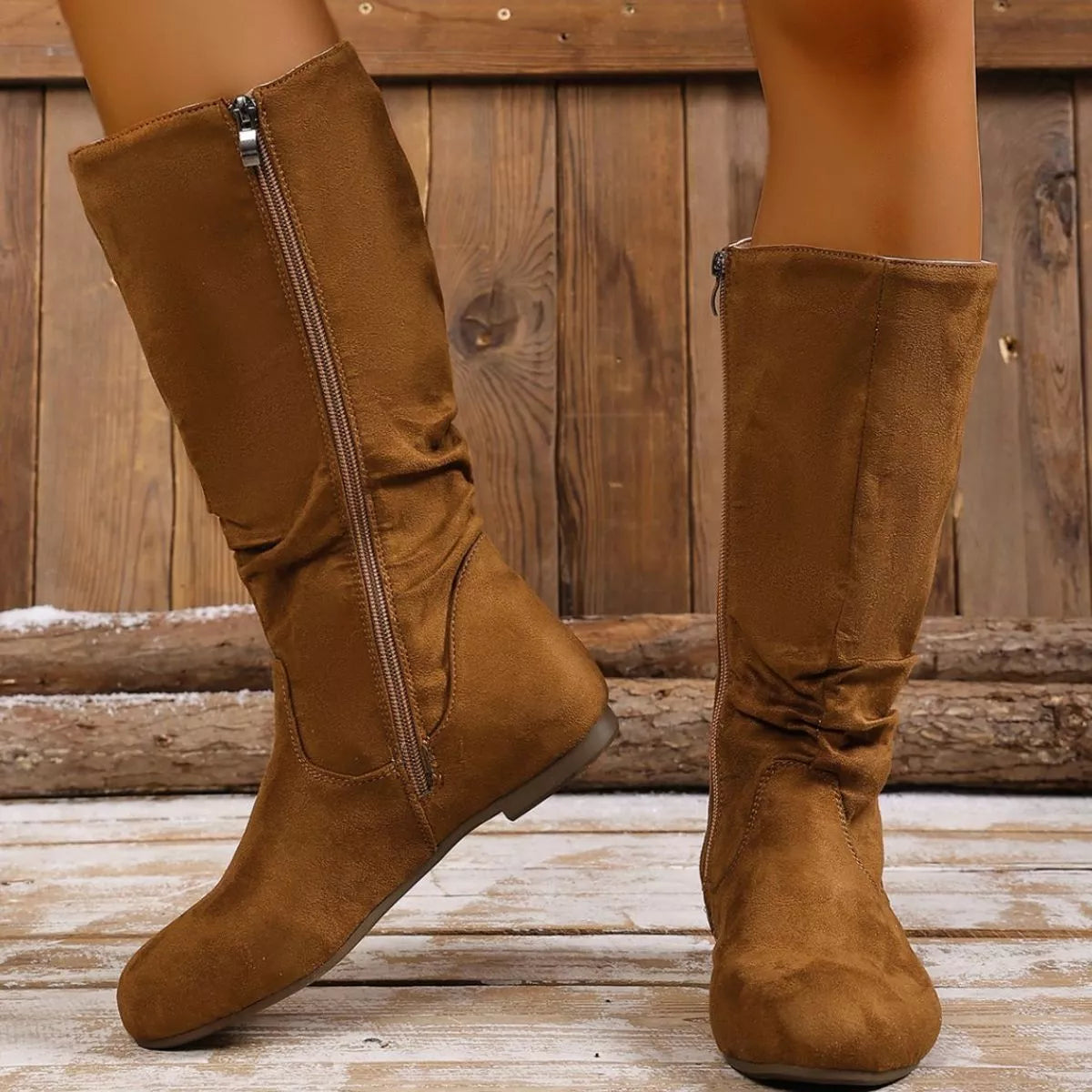 Round toe side zip boots from Trendsi featuring sleek design and sturdy sole, perfect for casual or stylish wear.
