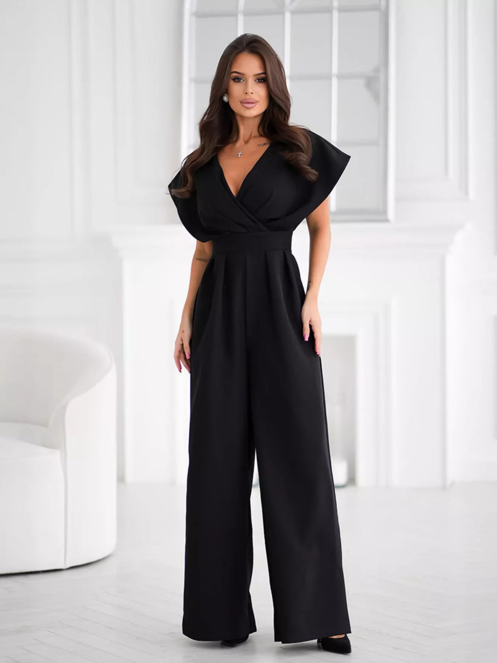 Shopimist surplice wide-leg jumpsuit with V-neck, long sleeves, and flowy silhouette, shown in beige fabric.