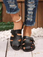 Shopimist comfortable slip-on leather sandals with adjustable buckle, featuring a sleek design and cushioned sole for casual wear.