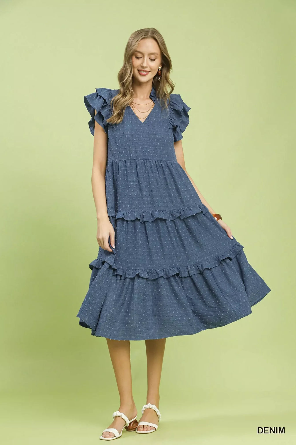 Umgee textured ruffle sleeve tiered midi dress displayed on model, showcasing its stylish design and fabric details.