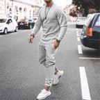 Plus size men's full size round neck long sleeve top and pants set by Shopimist, featuring a coordinated casual outfit.