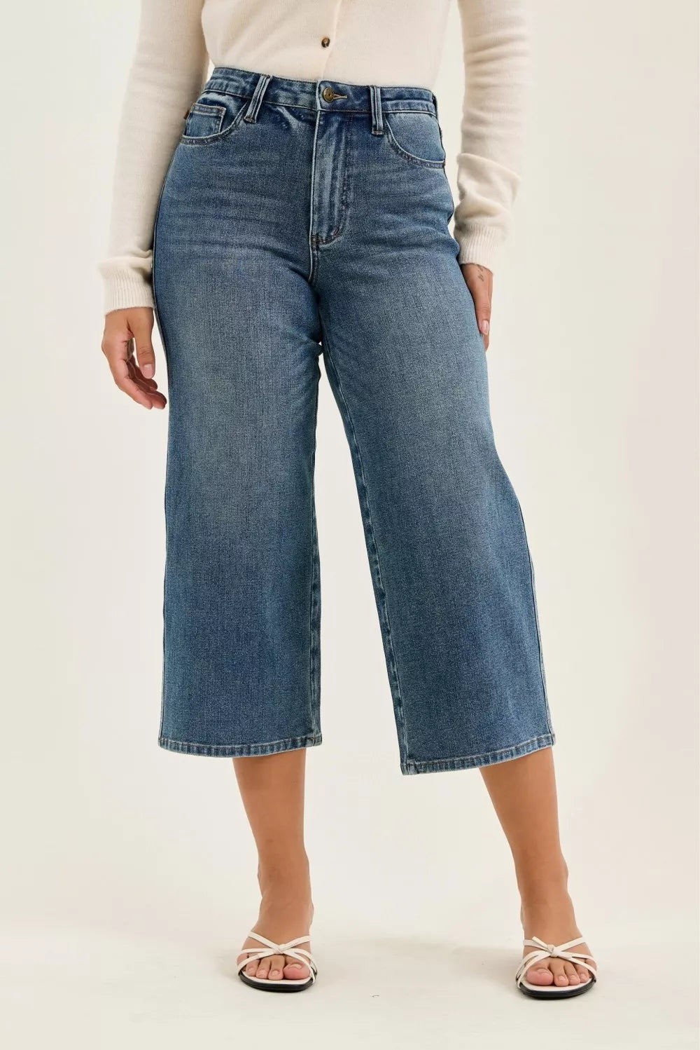 Plush Fashion Hub Judy Blue high waist Dottie wide crop jeans in medium quarry fade with distressed details and rolled cuffs.