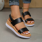 Open toe wedge sandals by Shopimist with tan leather straps and cork heels, perfect for summer casual wear.