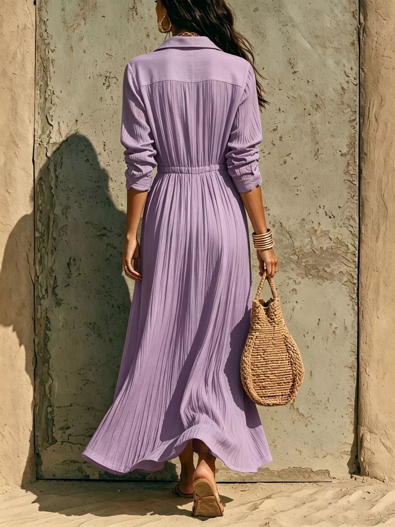 Plus size textured long sleeve maxi dress with button front from Trendsi, shown in a full-length view.