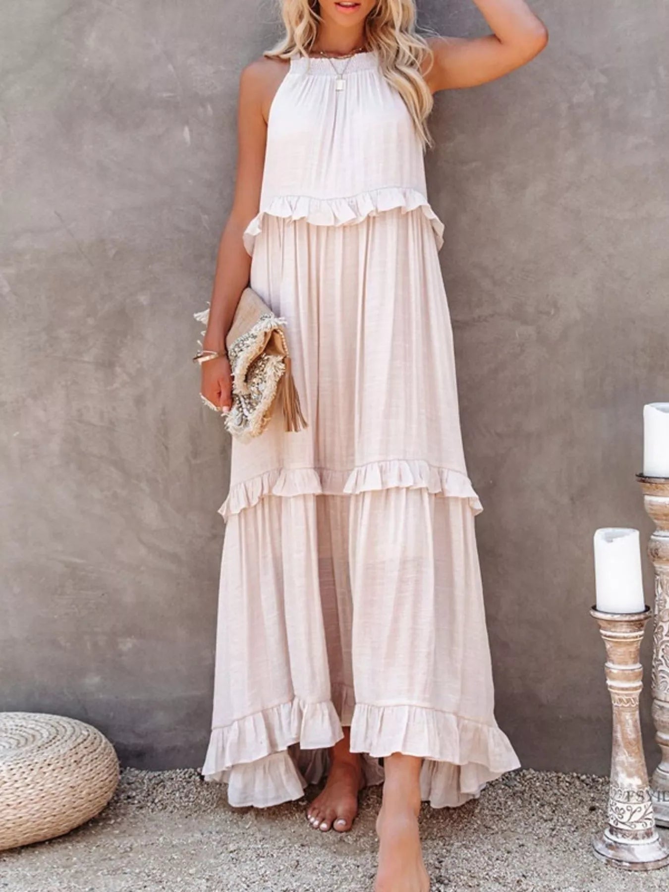 Ruffled tiered sleeveless maxi dress by Plush Fashion Hub featuring flowing fabric and layered ruffle details.