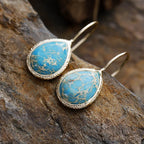 Copper natural stone teardrop earrings featuring a polished stone and elegant design, perfect for stylish accessorizing.