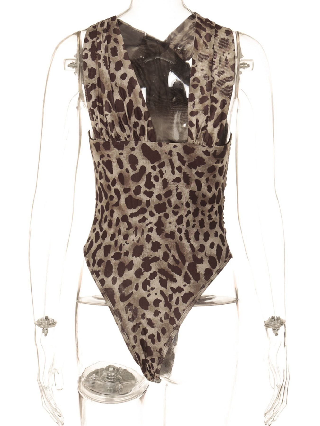 Leopard print asymmetrical ruched bodysuit by Trendsi, stylish animal print one-piece top with fitted design and ruched details.