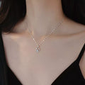Sterling silver zircon pendant necklace with a sparkling gemstone, showcasing elegant jewelry design.
