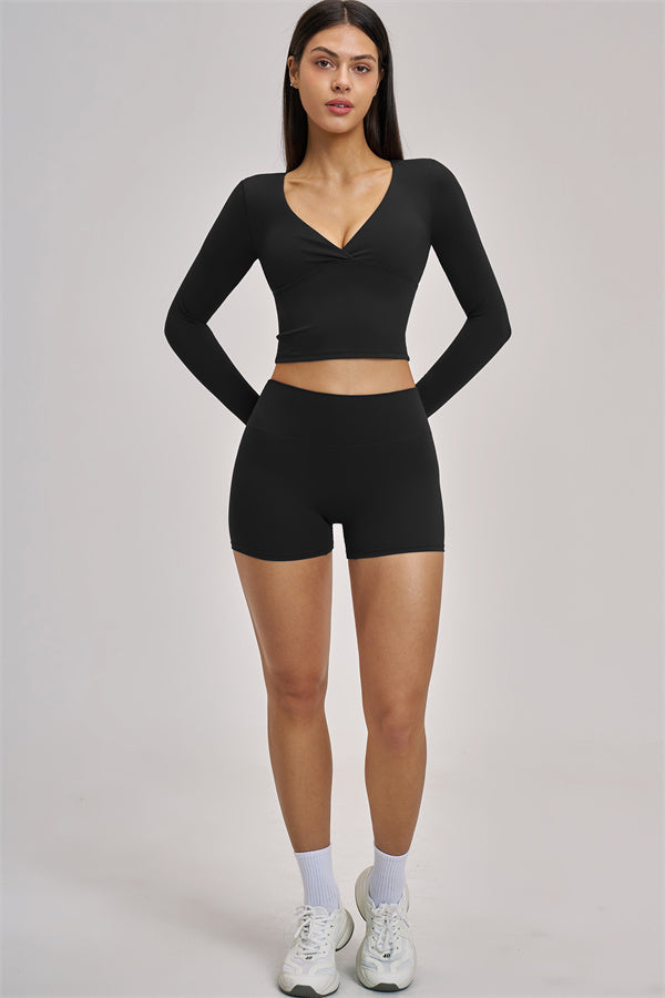 Fitglutes Activewear long sleeve crop top with fitted design, shown in a stylish, comfortable workout outfit.