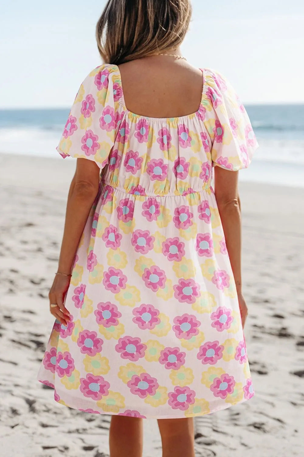 Floral square neck puff sleeve cotton midi dress with pleated flared design by Plush Fashion Hub, showcasing a stylish and feminine look.
