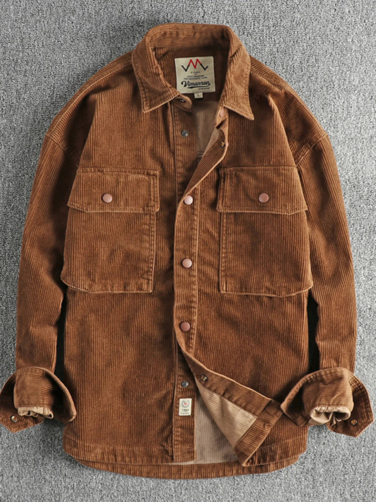 Men's plus size corduroy button-up long sleeve jacket by Trendsi, shown in a stylish, textured corduroy fabric with front buttons.