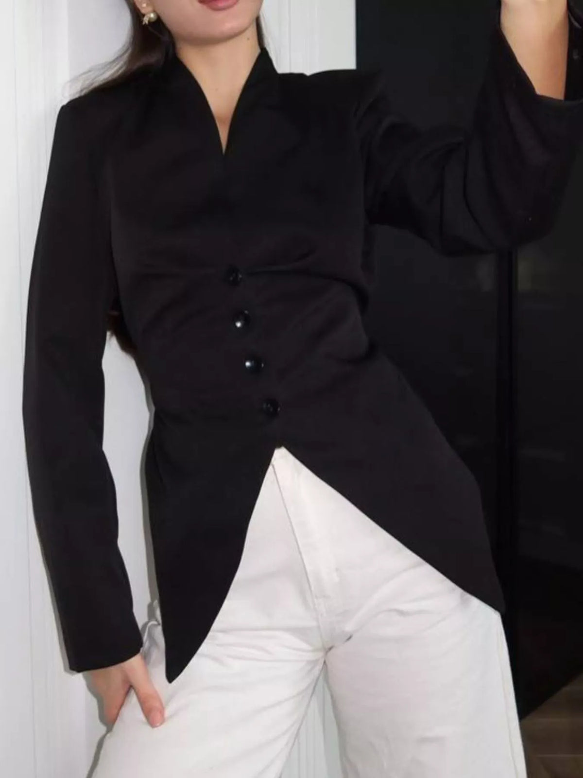Slim-fit asymmetric hem blazer by Trendsi, shown in black, tailored with a modern fit and stylish asymmetric hem detail.