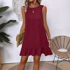 Women's ruffle lace-up mini dress by Plush Fashion Hub featuring short sleeves and a loose, beach-ready design.