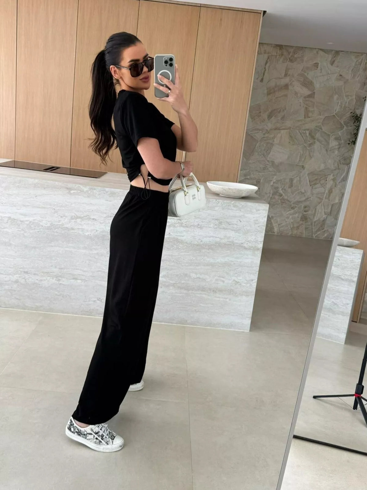 Plush Fashion Hub drawstring crop top and wide-leg pants set, featuring a stylish matching two-piece outfit with comfortable fit.