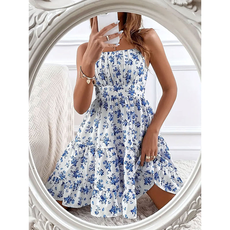 Floral print smocked mini dress with spaghetti straps, slim fit and flowy design, perfect for casualwear by FitiqueFit.