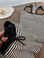 Striped tank top and shorts set by Trendsi, featuring a casual summer look with lightweight fabric and vibrant stripe pattern.