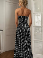Polka dot strapless maxi dress by Shopimist featuring a flowy silhouette and bold dot pattern, perfect for summer outings.