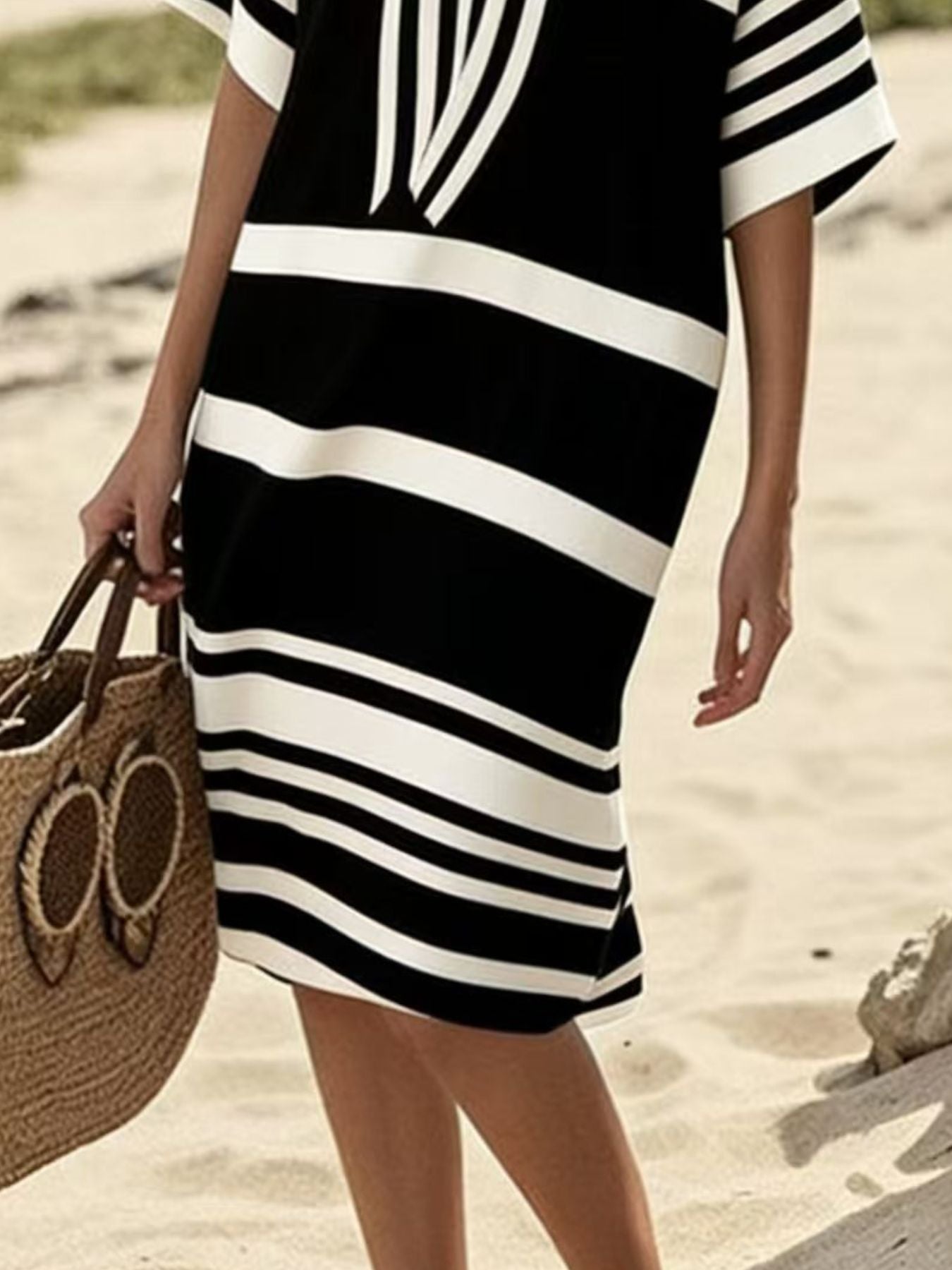 Plus size women's striped half-sleeve midi dress from Plush Fashion Hub, casual chic everyday wear, featuring a stylish striped pattern.