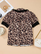 Leopard print short sleeve blouse with lace trim and button front from Plush Fashion Hub, stylish and lightweight women's top.