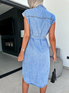 VYSN denim dress with collared neck, cap sleeves, and a button front, styled for casual fashion.