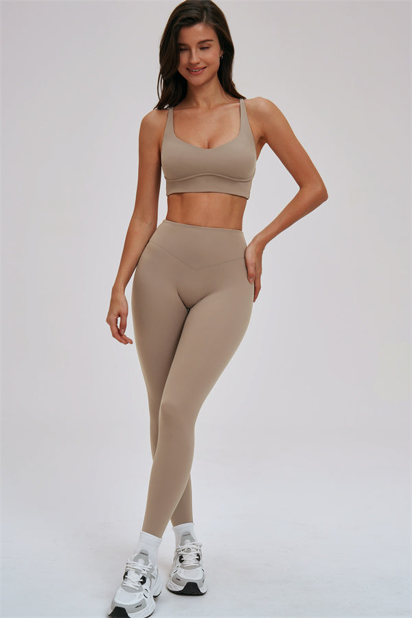 Fitglutes Activewear sports bra and leggings set featuring a cross-back sports bra and matching leggings for active workouts.