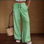 Women’s striped wide-leg trousers with lace-up elastic waist and loose fit, by Plush Fashion Hub, shown on a model.