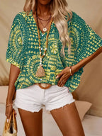 Women's printed V-neck half sleeve casual top from Plush Fashion Hub, soft stretch fabric, stylish office blouse.