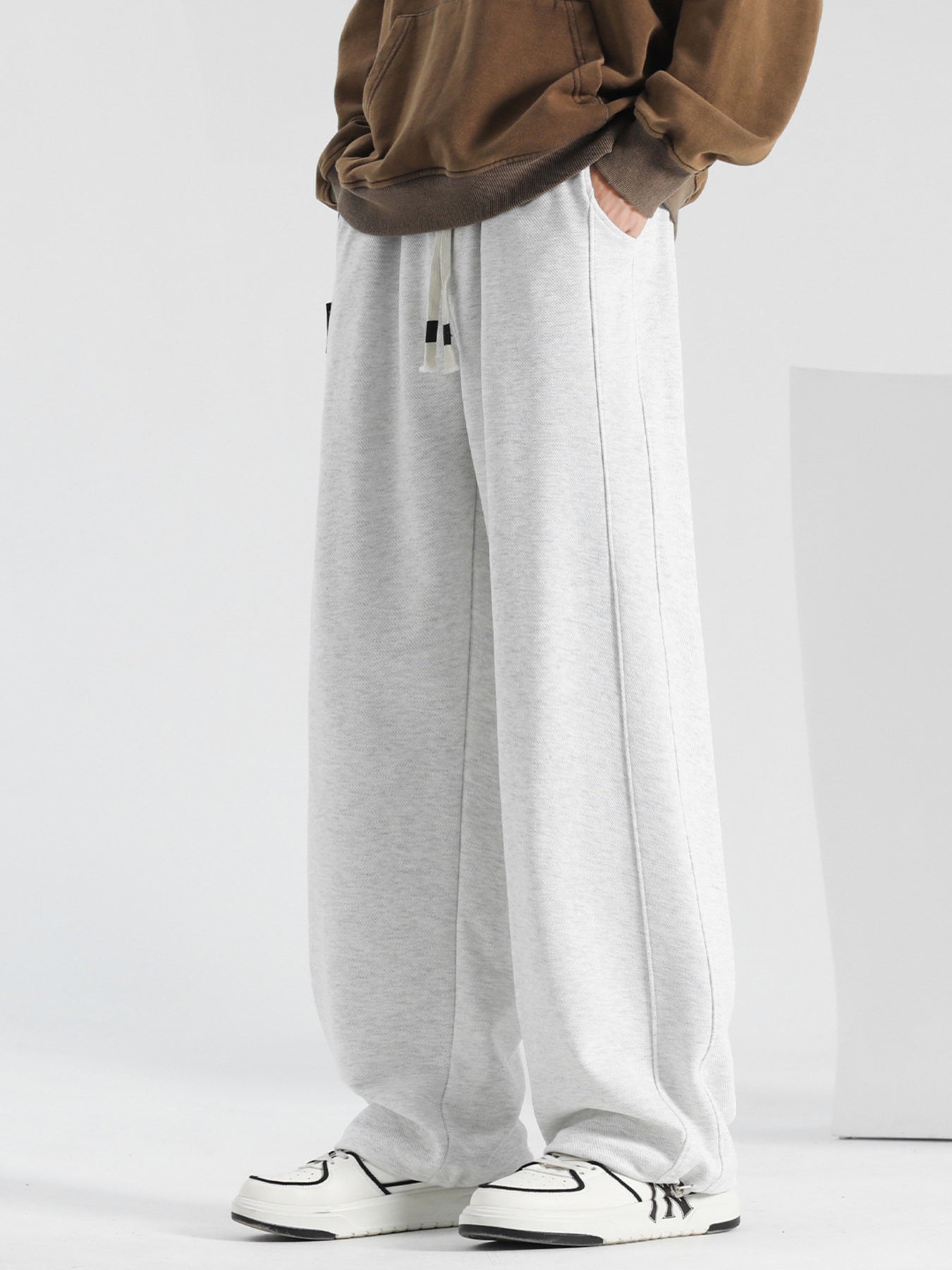 Men's plus size casual loose-fit drawstring pants by Shopimist, featuring comfortable fabric and relaxed fit for everyday wear.
