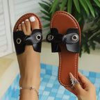 Shopimist bow embellished flat sandals with open toes, featuring decorative bows and a minimalist design, perfect for casual wear.