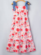 Floral print tie-shoulder midi dress with pockets, lightweight summer dress by Trendsi, shown on a model in a bright outdoor setting.