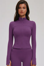 Fitglutes Activewear 3-piece set with Kinetic Zip Jacket, cross-back sports bra, and matching leggings for gym workouts.
