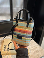 Striped woven mini crossbody bag with adjustable strap, trendy bag by Trendsi featuring colorful striped pattern and compact design.