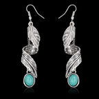 Turquoise alloy leaf-shaped artificial earrings with intricate leaf details, stylish jewelry by Shopimist.