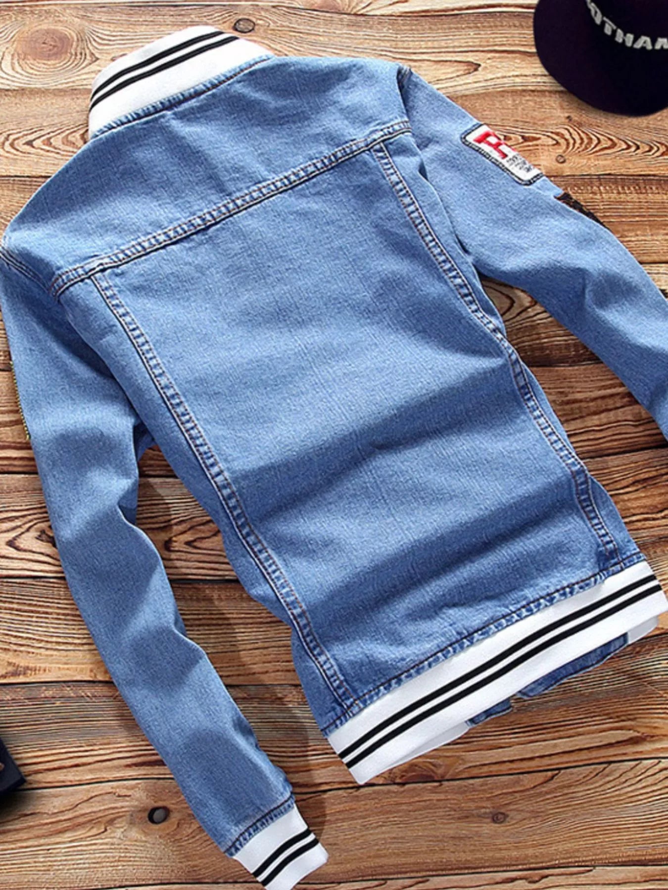 Men's slim fit denim jacket by Plush Fashion Hub, shown in full size and plus size, featuring classic blue denim and button closure.