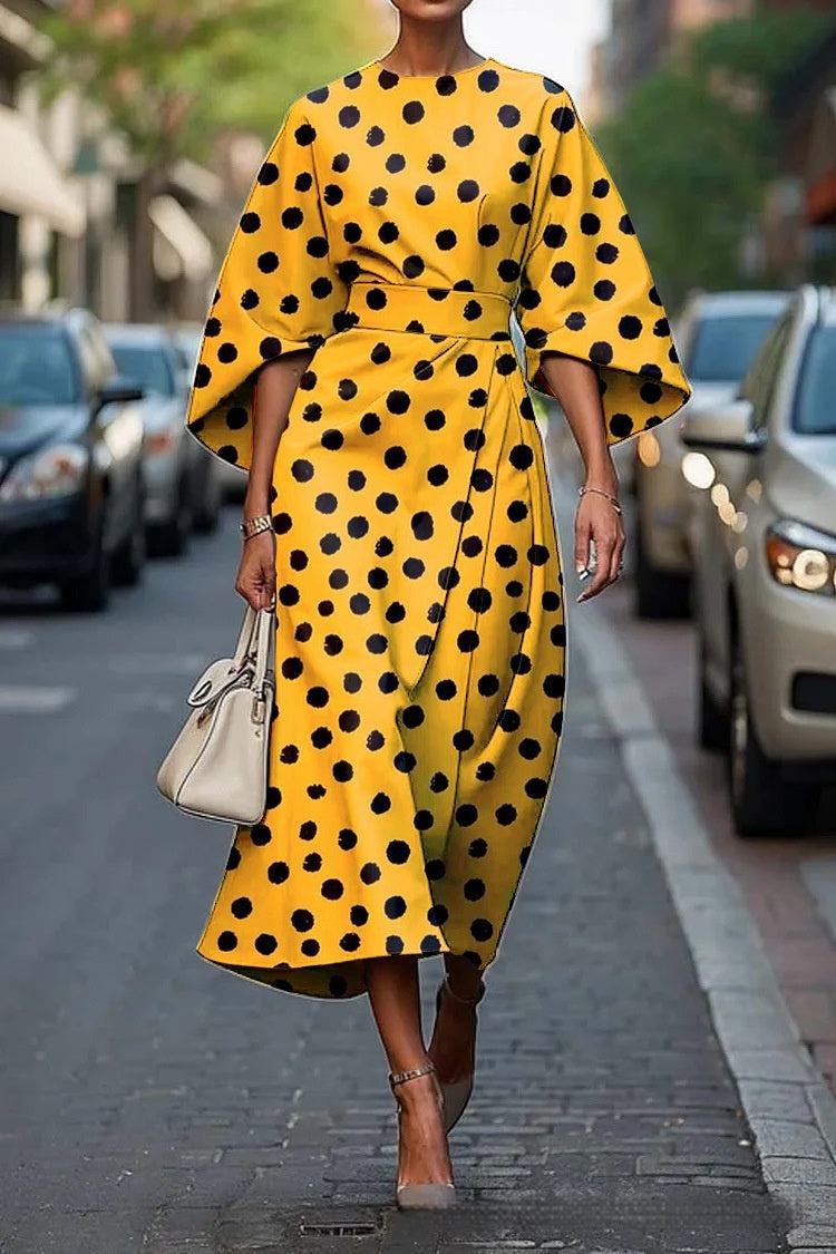 Flowy maxi dress with geometric print and batwing sleeves from Plush Fashion Hub, casualwear style in XS to XXXL sizes.