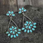 Artificial turquoise teardrop earrings by Shopimist featuring vibrant blue-green stone dangles and silver hooks.