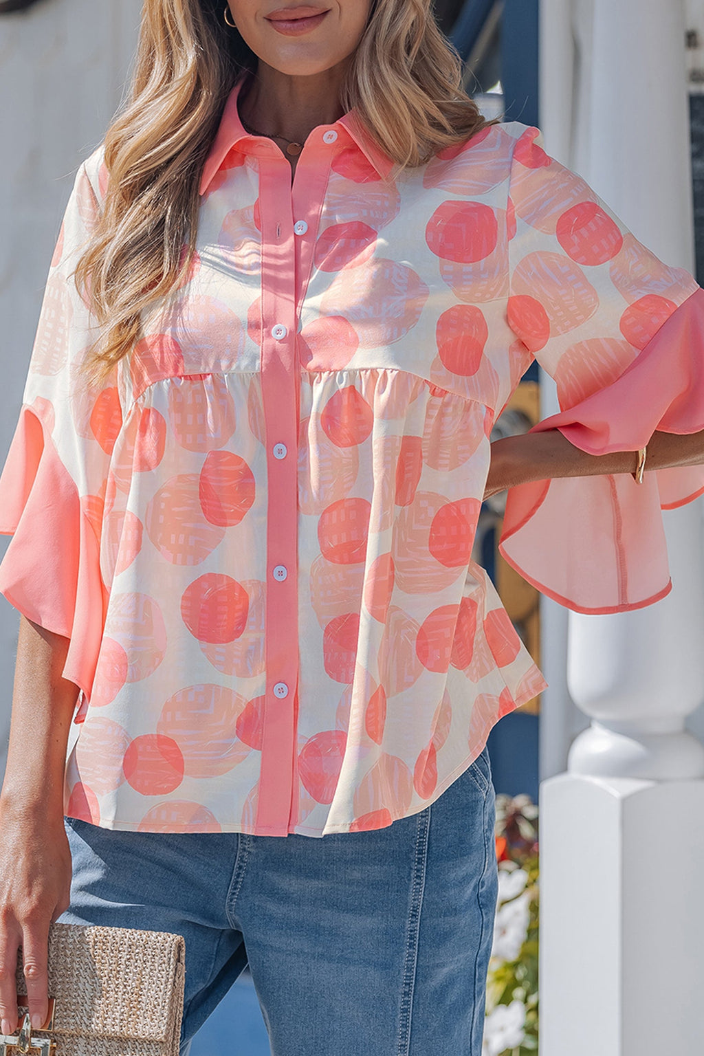 Light blue Angelica short sleeve babydoll blouse from Threaded Pear, featuring a relaxed fit and soft fabric.