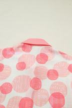 Angelica short sleeve babydoll blouse by Threaded Pear, lightweight fabric with a loose fit and feminine design.