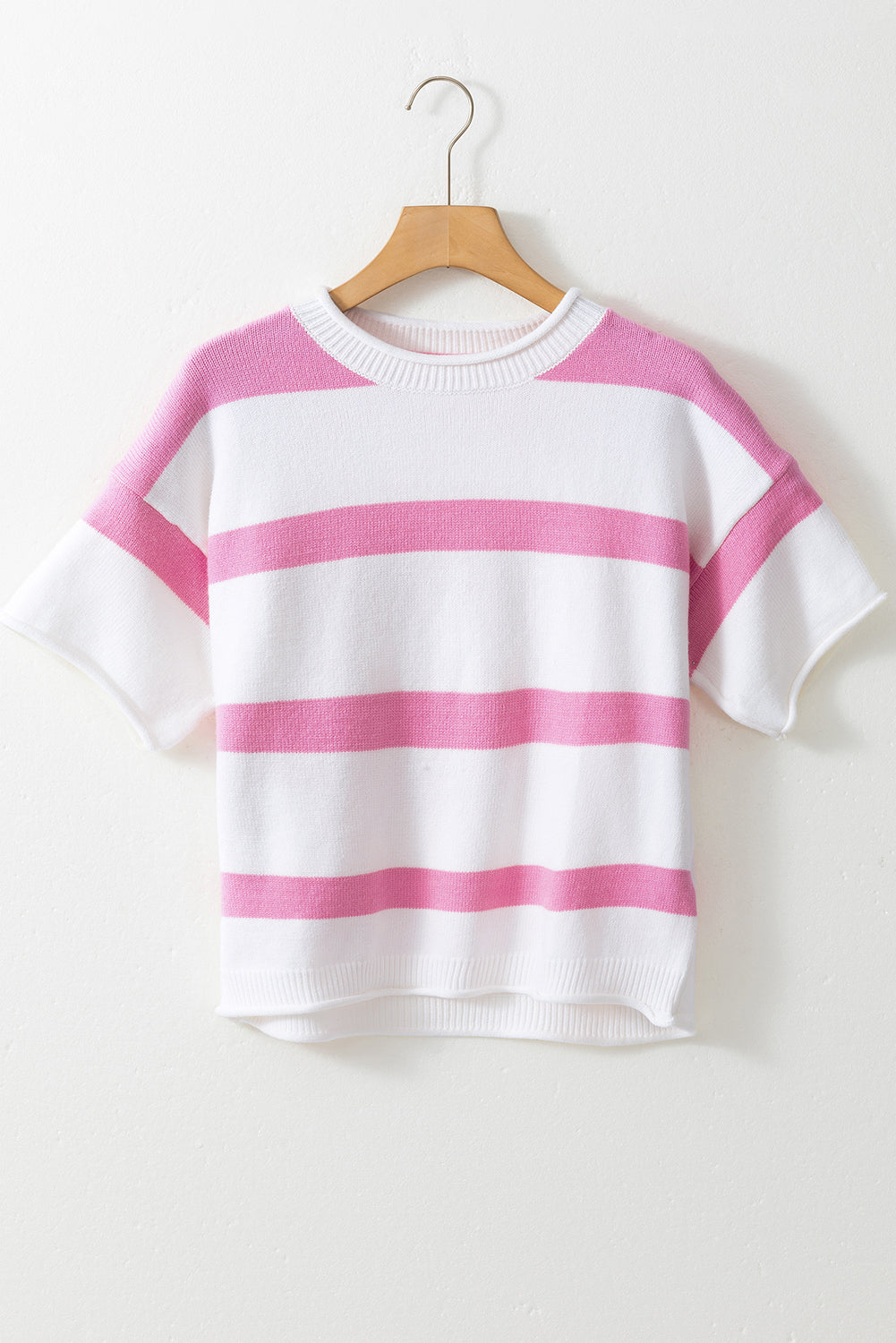 Lightweight knitted summer short sleeve sweater from Threaded Pear with a relaxed fit and breathable fabric.