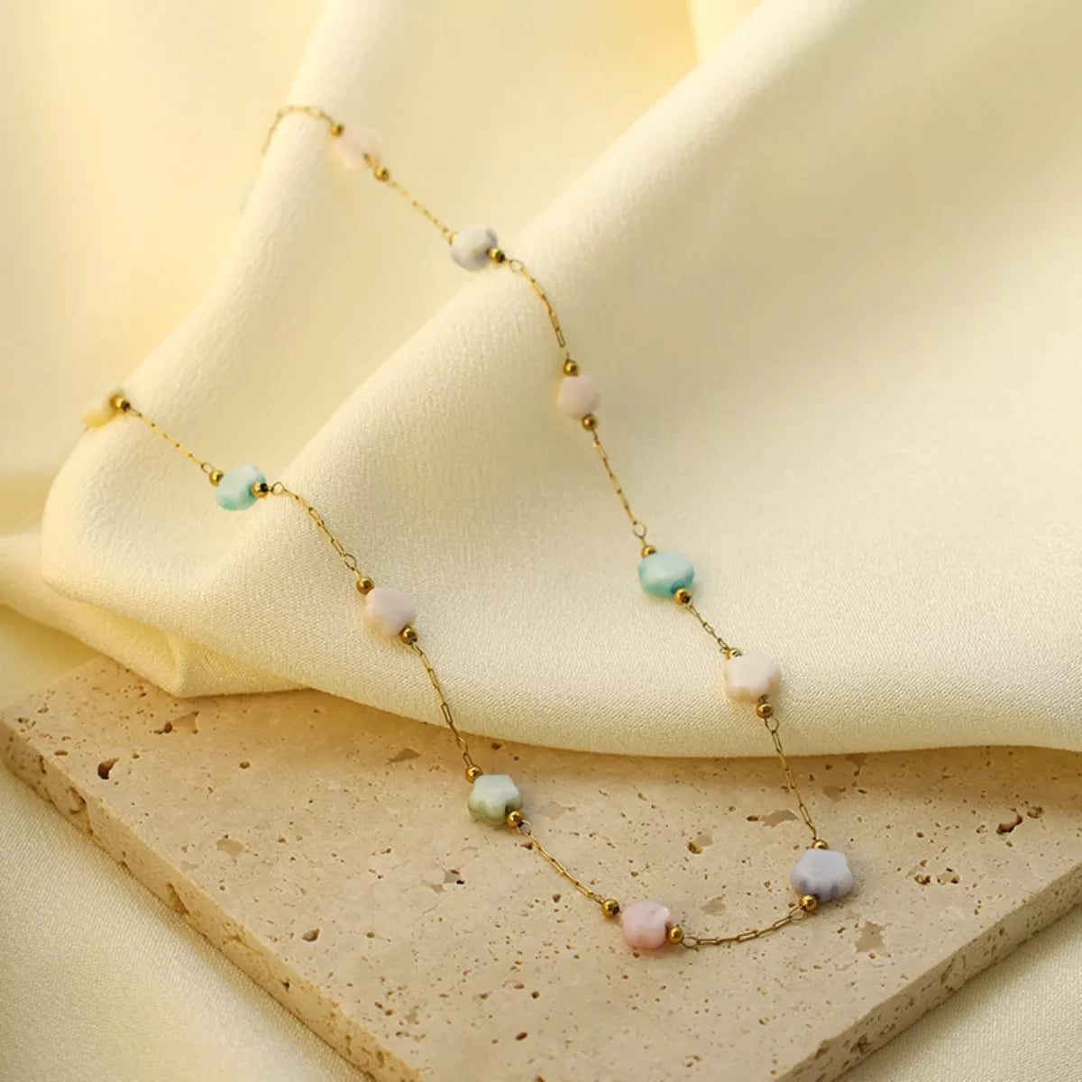 18K gold-plated star charm necklace from Plush Fashion Hub, featuring a delicate chain and sparkling star pendant.
