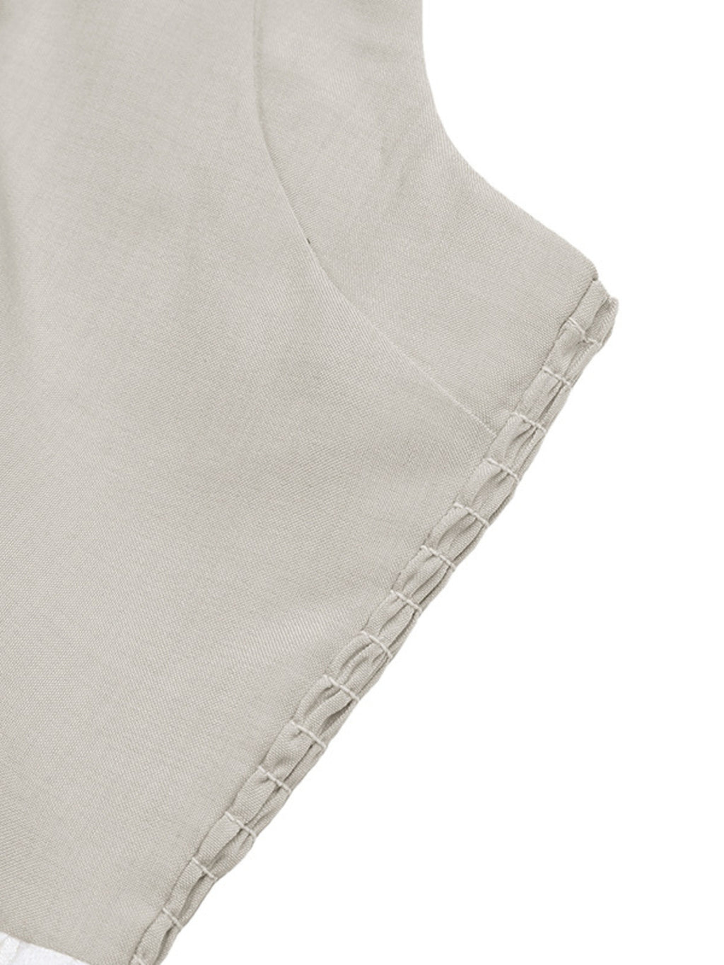 Elegant two-tone halter neck maxi dress with ruched details and pockets by Plush Fashion Hub, shown in a flowing design.