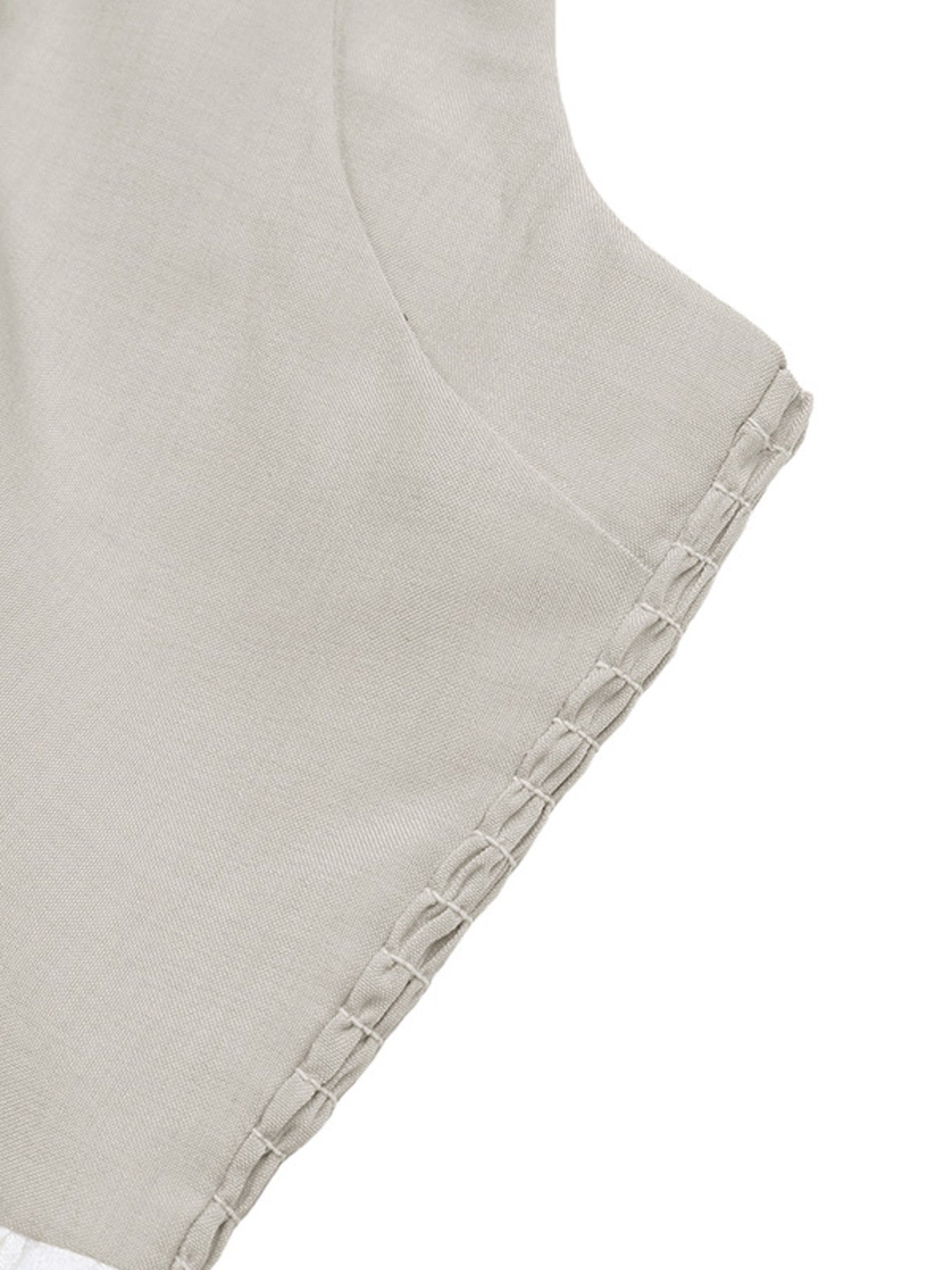 Elegant two-tone halter neck maxi dress with ruched details and pockets by Plush Fashion Hub, shown in a flowing design.