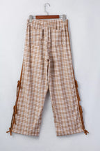 Casual plaid print pants with tie detail from Plush Fashion Hub, showcasing relaxed fit and stylish design for everyday wear.