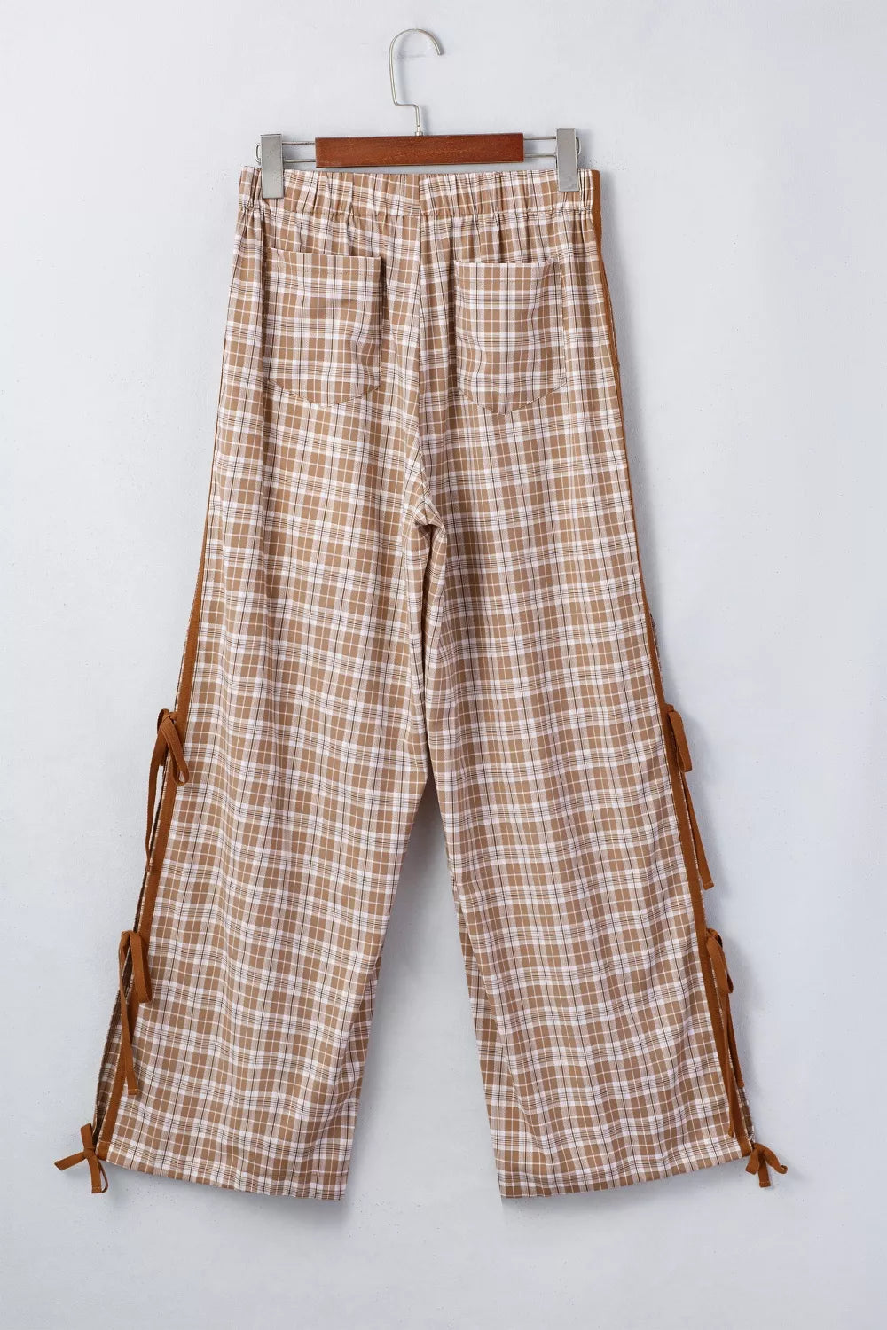 Casual plaid print pants with tie detail from Plush Fashion Hub, showcasing relaxed fit and stylish design for everyday wear.