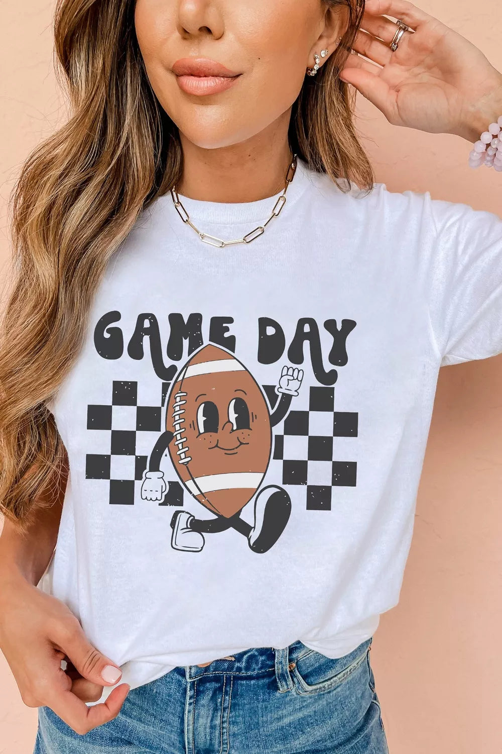 Plush Fashion Hub Game Day football graphic T-shirt, casual tops with sports-themed print, comfortable and stylish for fans.