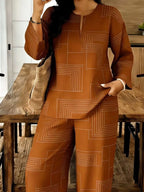 Shopimist geometric print relaxed fit top and pants set, featuring a modern design and comfortable fabric in a stylish ensemble.